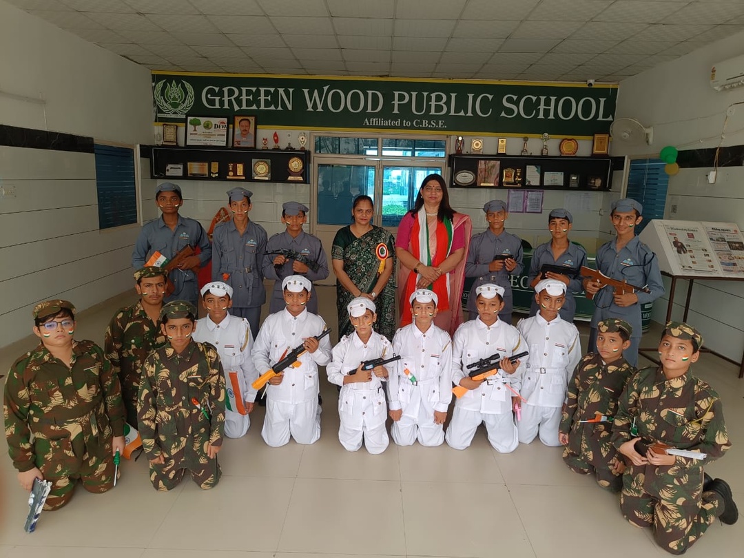 Students dressed as Army, Navy and Air Force personnel for a patriotic presentation
